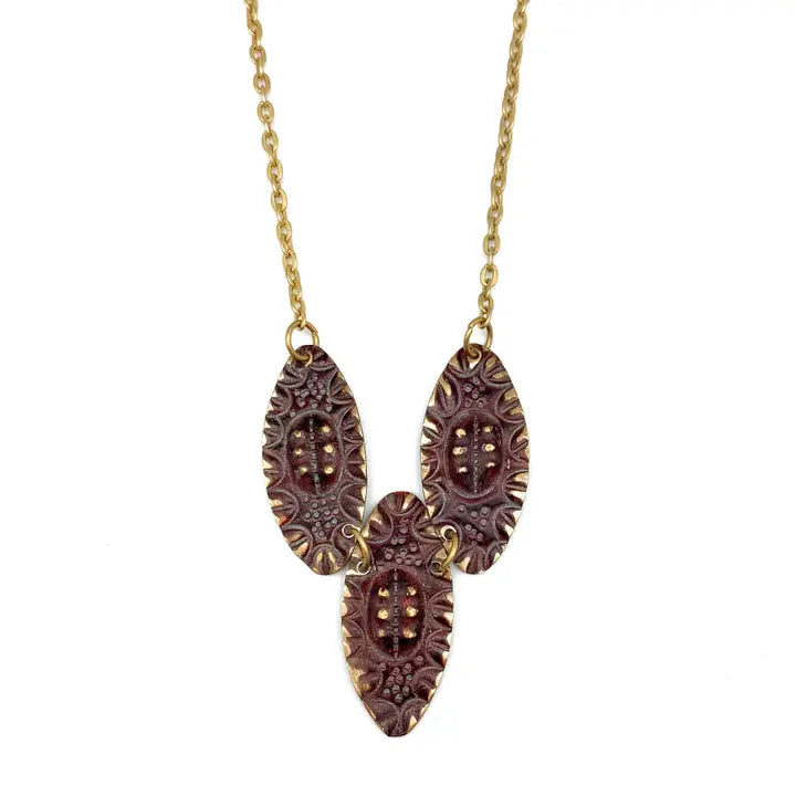 Brass patina necklace - Plum purple dots and lines ovals