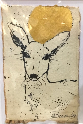 Doe with gold moon