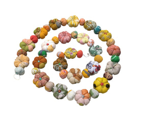 Mini saree pumpkin bead garland