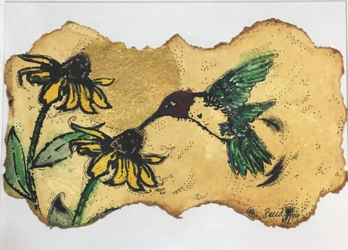 Ruby red throated humming bird