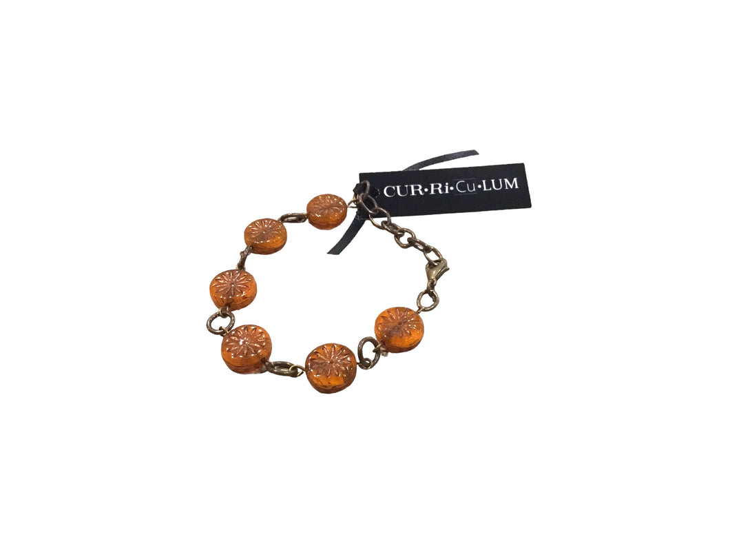 Orange starburst Czech bead bracelet