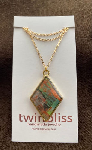 Diamond on gold necklace