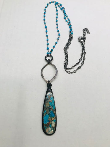 Compressed teardrop rosary