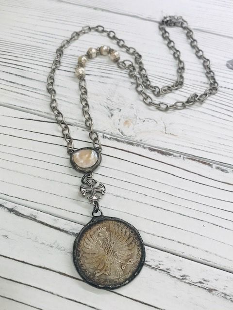 Coin w/ bird and pearl cross