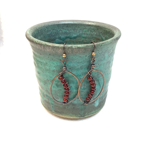 Oval with Red-orange beads Copper Earrings