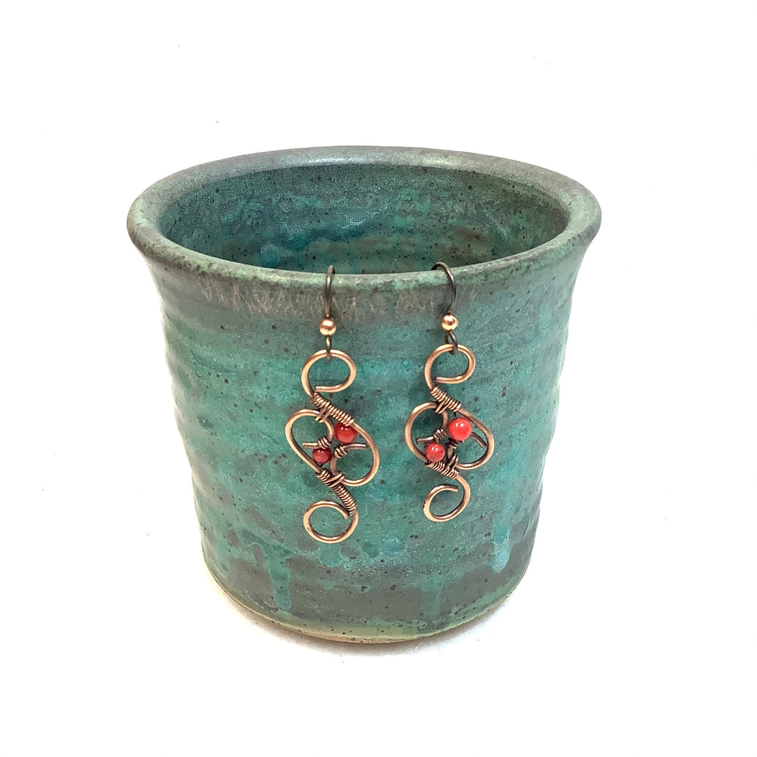 Drop swirls with red beads Copper Earrings