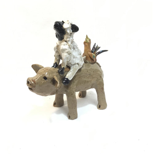 Brown Pig with a Sheep and Chicken Hitching a Ride