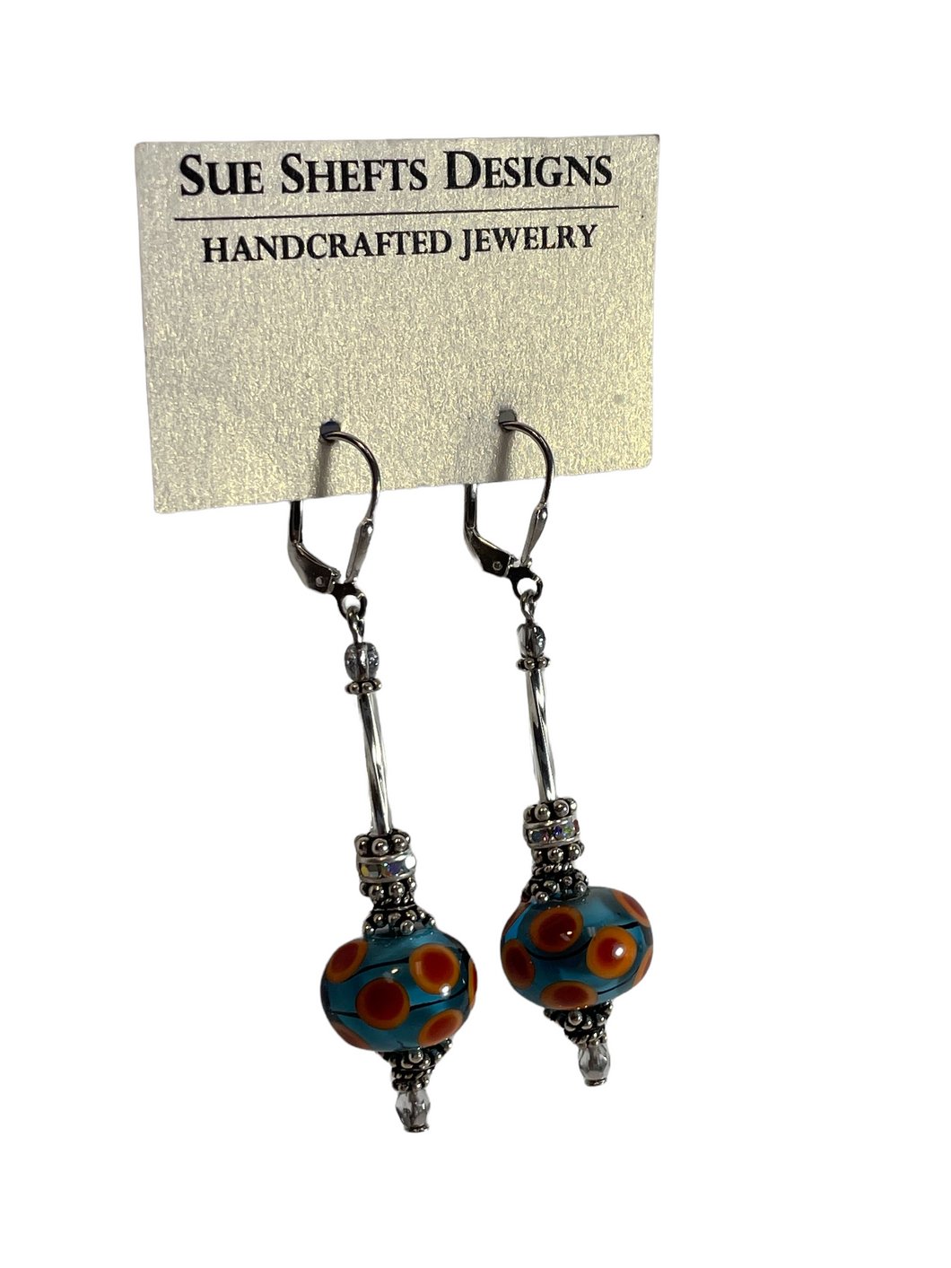 Blue with orange polka dot dangle earrings