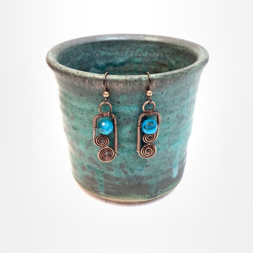 Double-Spiral with light blue bead Copper Earrings