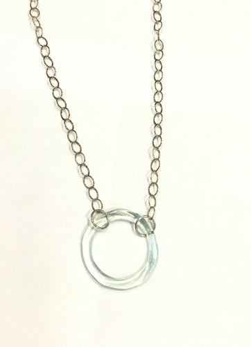 Coca-Cola large circle on large chain