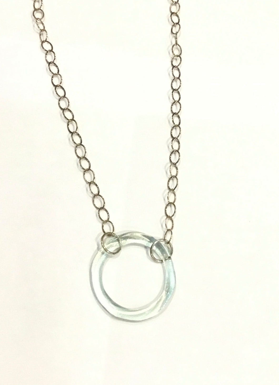 Coca-Cola large circle on large chain