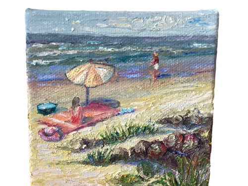 Girl On Beach Towel