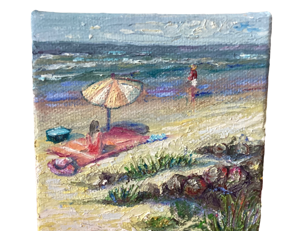 Girl On Beach Towel