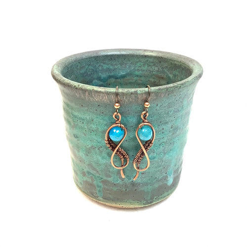 Lemniscate with turquoise bead Copper Earrings